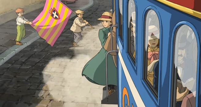 Sopphie with green dreess standing in the 🚉 door.

Anime: Howl's Moving Castle (2004)