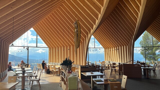 And the view from the inside of the hut. Three rooms branch out from a single point, overlooking the valley through floor to bottom windows.