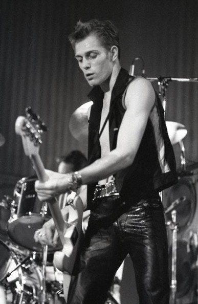 Paul Simonon performing on bass