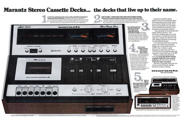 This is an advertisement from Esquire Magazine, January 1977, page 44. The ad features "Marantz Stereo Cassette Decks". The reason I selected this photo is that it shows the typical design aesthetic of consumer electronics of the late 1970s. The main features shown in the equipment shown in this ad are:
1. A mix of wood-grain and silver, where the silver is likely brushed aluminum. 
2. Controls that are very physical in nature, such as buttons that use physical latches to retain on/off settings…