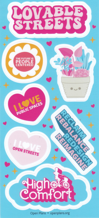 Pink themed stickers from Open Plans.
Saying:  Lovable Streets, The Future is People Centered, I love Public Spaces, I love Open Streets.  Reclaim, Rebalance, Reimagine, High Comfort.  Stickers are mostly in all caps and don't feel like shouting.