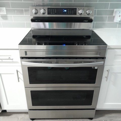 A Samsung radiant cooktop with a flexible double oven below.  It has replaced a Samsung gas cooktop and oven. It has an interesting oven door that is hinged in the middle allowing one to open just half of the oven and use the upper racks or broiler.  The oven door can also open fully revealing a full oven. I doubt I'll ever use the full oven but it's nice to have this option.  Using just the top oven saves energy too!  It's also possible to use both top and bottom ovens independently with different temperatures!  Magic!