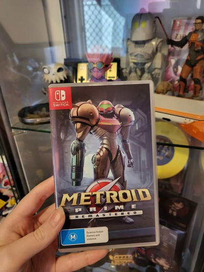 Revy holding Metroid Prime Remastered