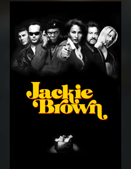 Poster for the Quinn Tarantino movie “Jackie Brown“. The cast appears in black and white at the top. The font is yellow and there’s a black-and-white bag of cash at the bottom.