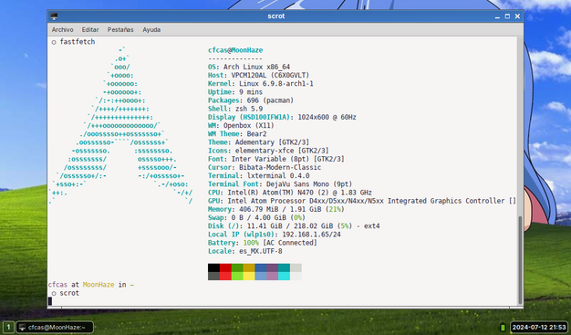 A computer desktop screenshot, with a terminal window open and the fastfetch output on it.