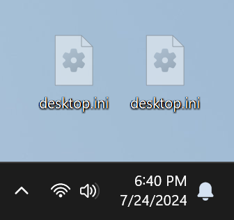 A screenshot of my Windows 11 desktop, showing 2 “desktop.ini” files right next to each other