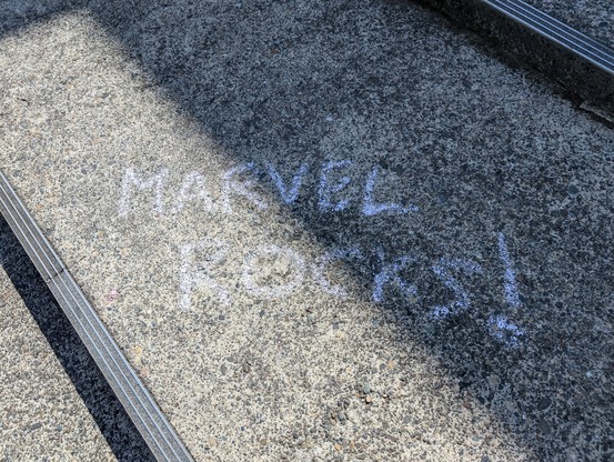 Pavement on which someone has written 
