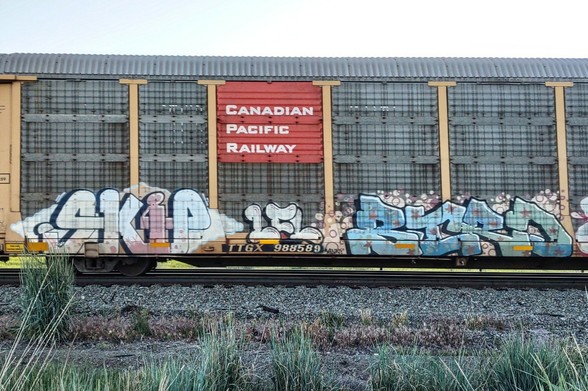 Train car with graffiti rolling through Kamloops BC Canada