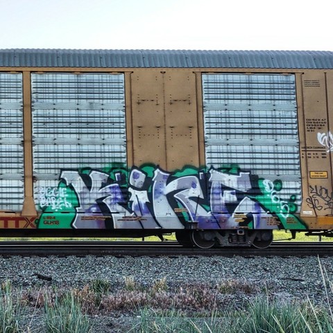 Train car with graffiti rolling through Kamloops BC Canada