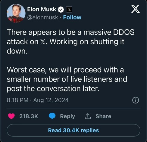 A tweet from Elon Musk's official account states there is a massive DDOS attack on X and they are working to shut it down. He mentions continuing with fewer live listeners and posting the conversation later. The tweet has engagement details below.