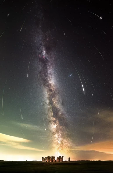 Images of meteors from this year's Perseids captured separately and merged into a single frame.