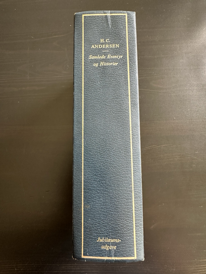 The spine of the book, with the author 