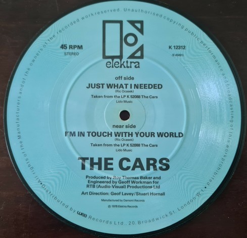 Flip side of the same picture disc, showing that it's

Just What I Needed / I'm In Touch With Your World
by
The Cars