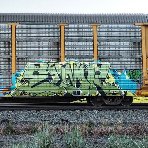 Train car with graffiti rolling through Kamloops BC Canada