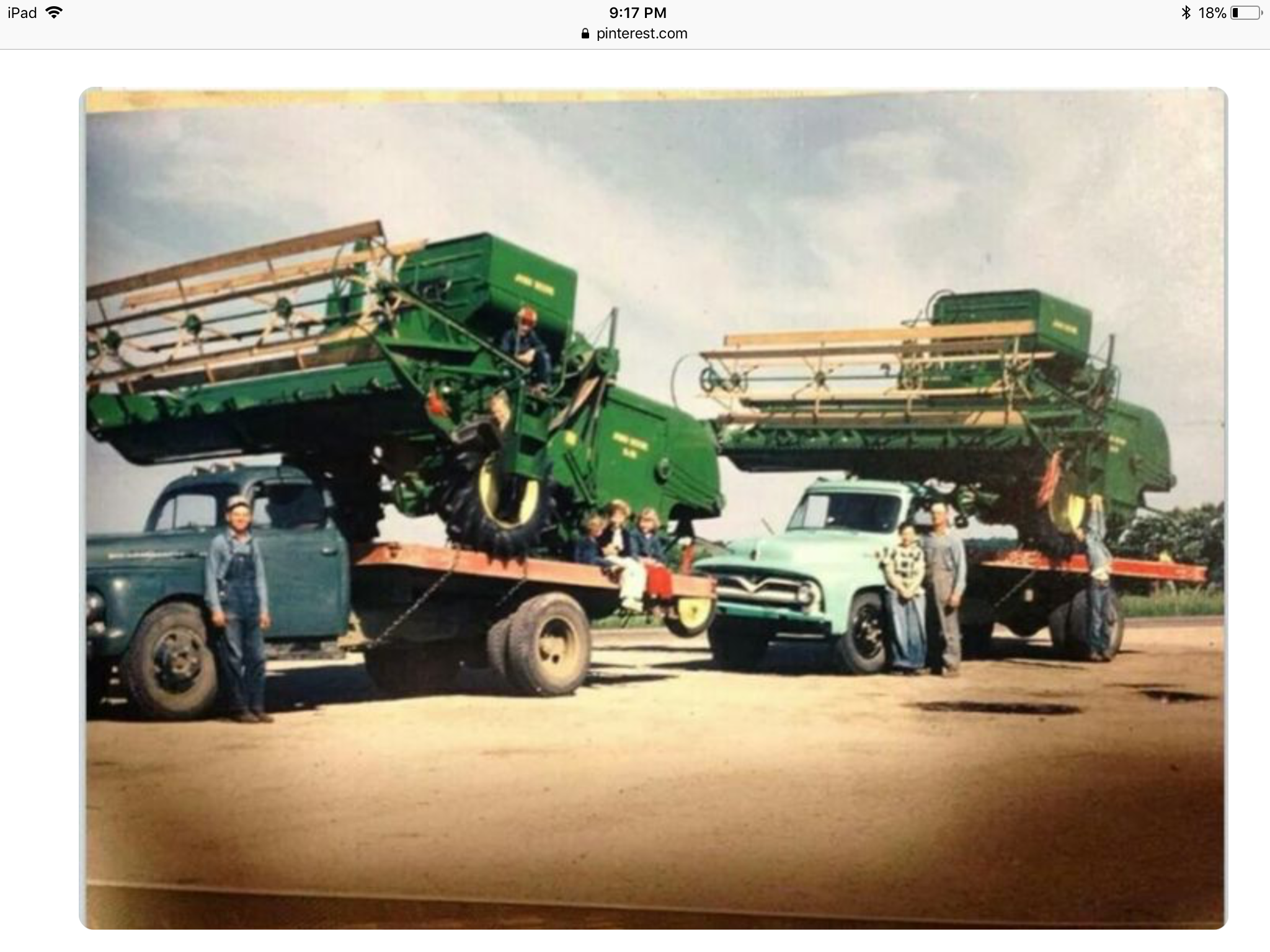 Custom combiners in the 1960s. Two combines on haul trucks traveled the country from south to north