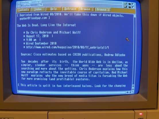 Reading an article on Gopher on an Amiga 500 in 2024.