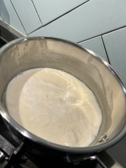 Soy milk simmering in a pot