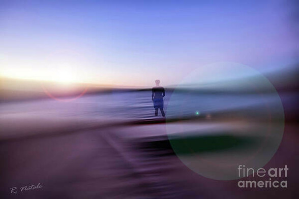 Abstract photo composite of a person walking into the water with a motion blur background to depict the Spirit of It