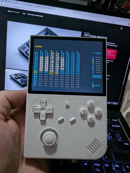 RG40XXV game console running a music tracker program