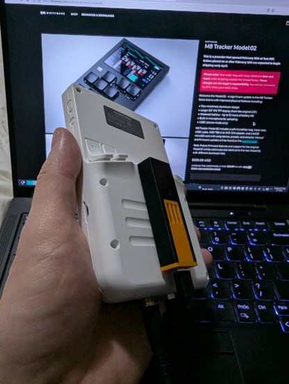 Rear of RG40XXV console with a Teensy 4.1 in a case stuck to the back