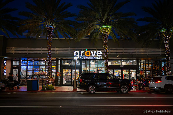 Grove supermarket front at night