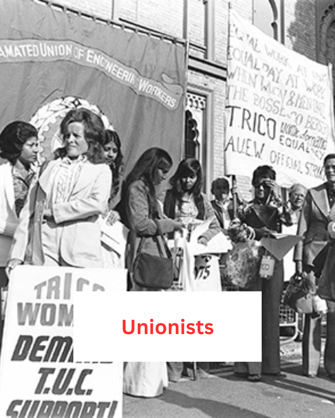 A group of white and brown women standing in front of large union banners. It's the 1970s - you can just tell. The red label reads 'unionists' A group of white and brown women standing in front of large union banners. It's the 1970s - you can just tell. The red label reads 'unionists'
