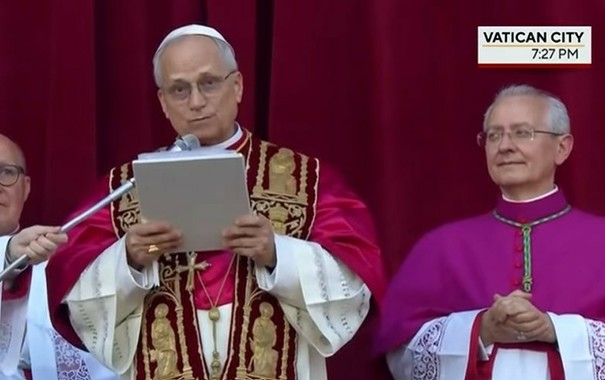 Screen grab of Pope Leo 14 speaking at a microphone. 