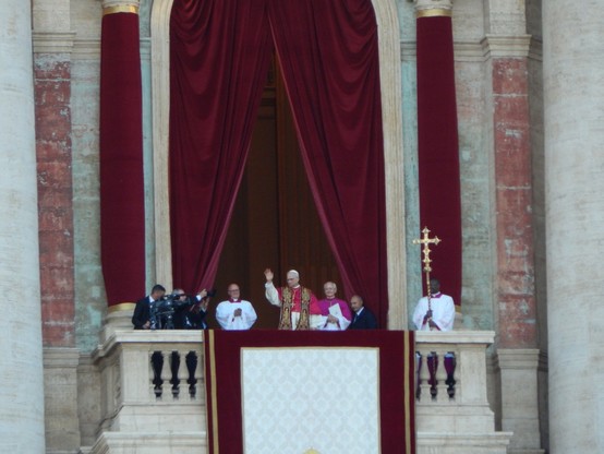 The Pope on a Vatican balcony.