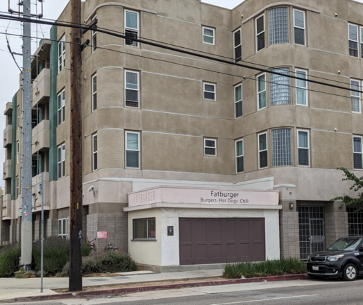 Burger stand tucked into an apartment complex