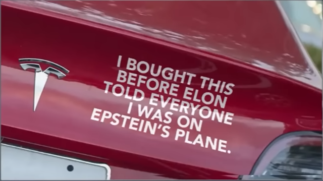 rear of a Tesla with text: "I bought this before Elon told everyone I was on Epstein's plane" on it.