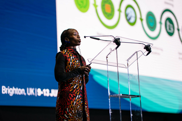 Maria Mvungi (TENET) delivering a Lighting Talk at TNC25 in Brighton