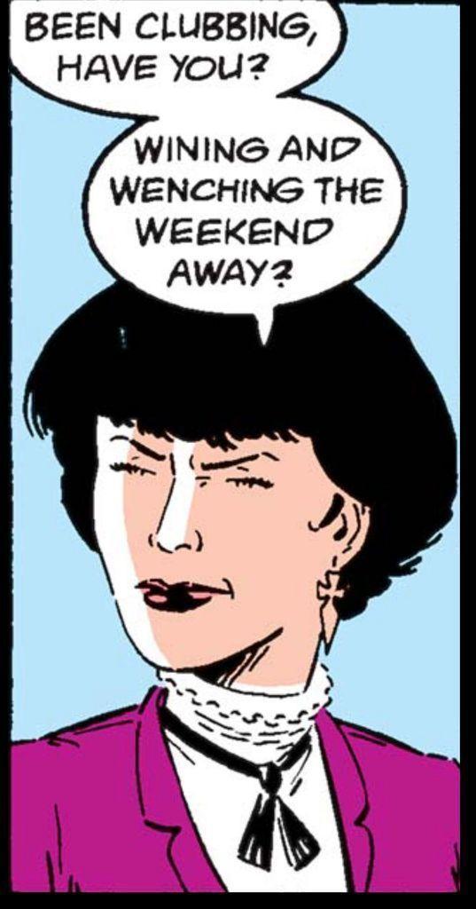 A woman with a short, black haired bob-cut dressed conservatively in a blouse with a ruffled collar tie, and purple jacket says to someone off panel, “Been clubbing have you? Winning and wenching the weekend away?“