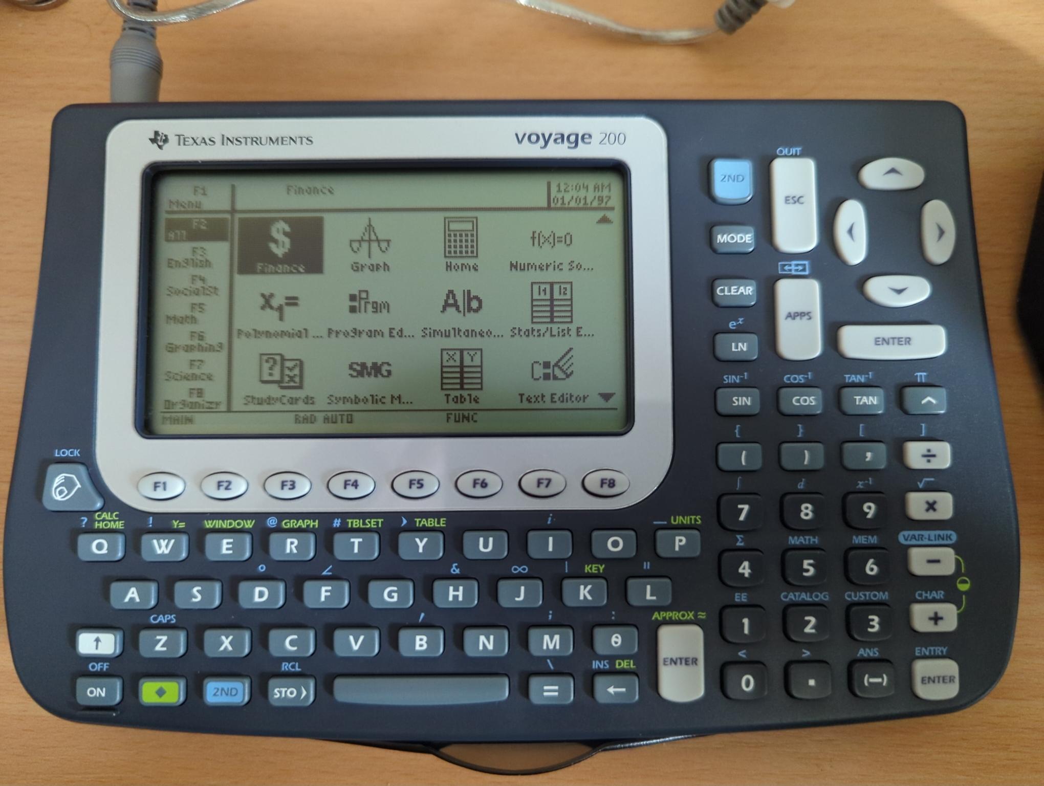 TI Voyage 200 showing the apps menu, connected to a SilverLink cable
