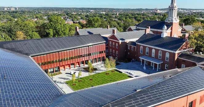 A aerial photo of a building with a courtyard.