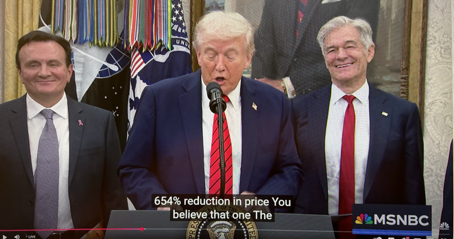 Trump saying: 654% reduction in price, can you believe that one? The two men behind him just smile