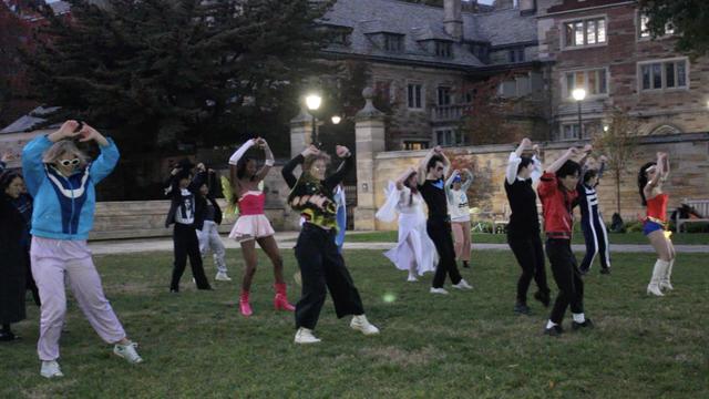 Students in costumes dancing