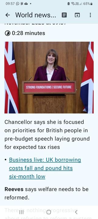 Chancellor of the Exchequer Reeves with not one but 2 imperial flags and the lectern slogan, "Strong Foundations| Secure Future"