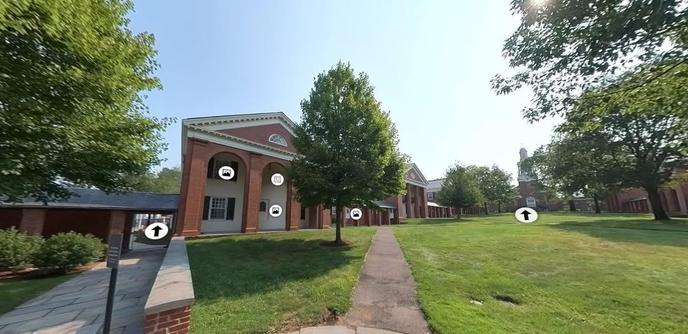 Screen shot of an online virtual tour of the Yale Divinity Quadrangle showing clickable icons over some areas of the photo.