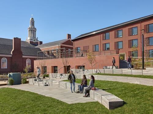 Students sitting in an outdoor amphitheater