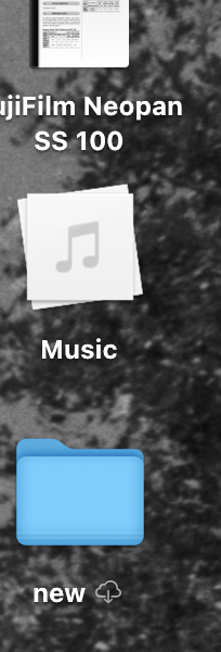 A screenshot of the desktop of a macOS system.