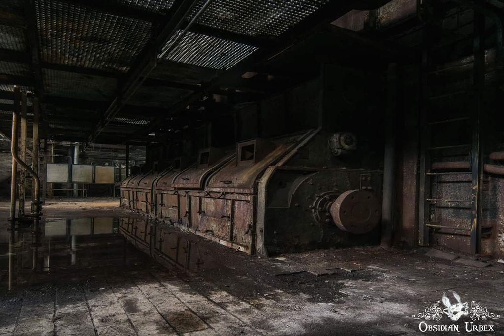 rusty machine in dark room