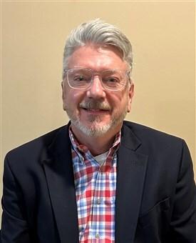 A man wearing glasses