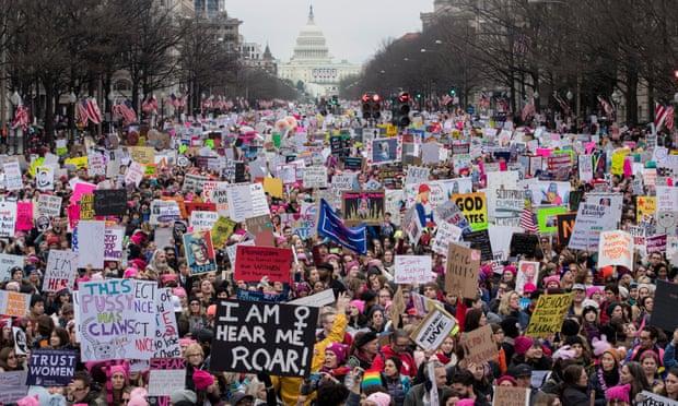 A photo of the Washington DC march showing the mall full of people.