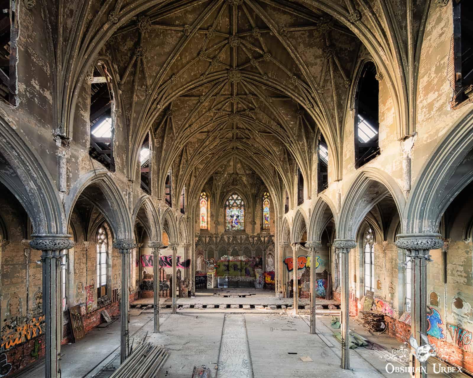 gothic revival style church, with graffiti