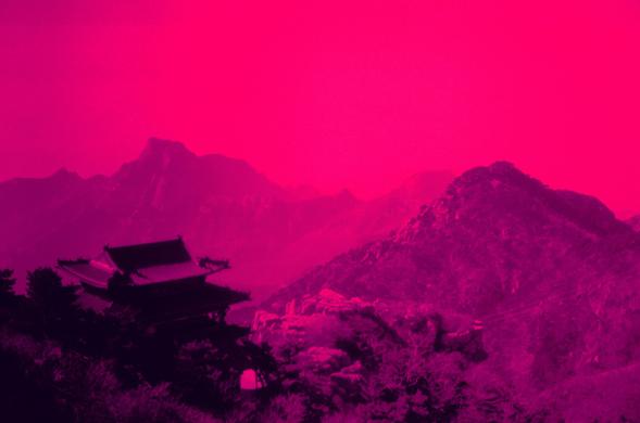 Harman Red 125 (FF)

English

A landscape scene dominated by a deep magenta hue. In the foreground, silhouettes of traditional East Asian architecture, likely a temple or pavilion with curved, upturned eaves, stand among dense trees. The background features rugged mountain peaks, partially obscured by mist or haze, creating a sense of depth and distance. The overall atmosphere is serene and mysterious due to the coloration and lighting.

中文

一幅以深洋红色调为主的风景照。前景中，传统东亚建筑的剪影，可能是一座寺庙或亭台，其屋檐翘角明显，周围环绕着…