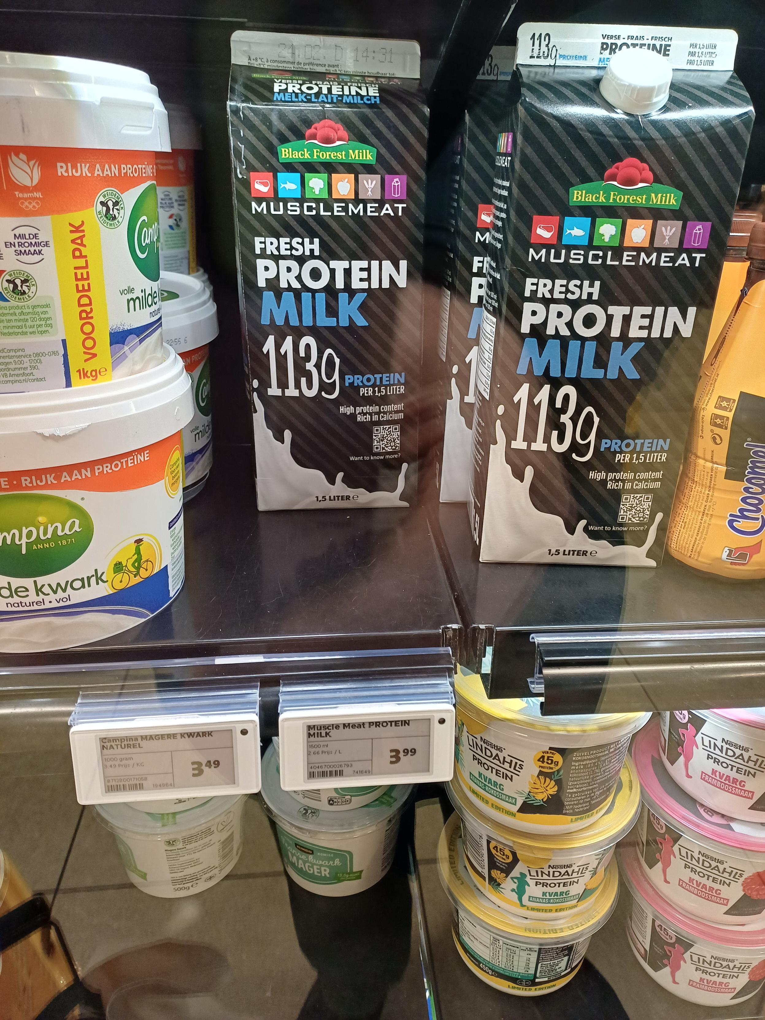 Dairy in a store.
Prominent in the picture is Extra Protein Milk of the ridiculous sounding brand MuscleMeat