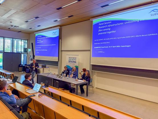 image of a panel speaking at the event