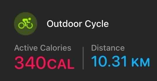 An activity tracker display showing "Outdoor Cycle" with metrics: 340 active calories burned and a distance of 10.31 kilometers.