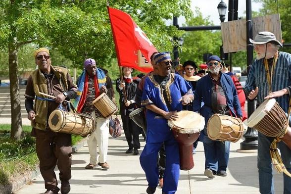 Divinity drummers leading the graduate procession
