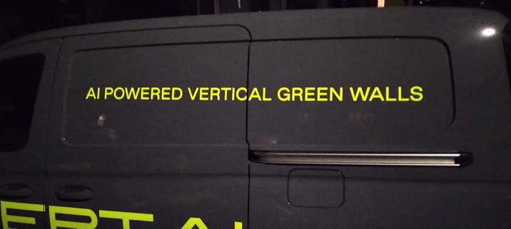 Slogan on a van:
"AI POWERED VERTICAL GREEN WALLS"